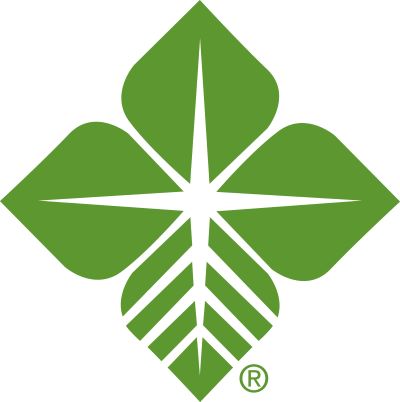 Green Farm Credit Logo of 4 leaf shapes with a white start in the middle, called a Biostar
