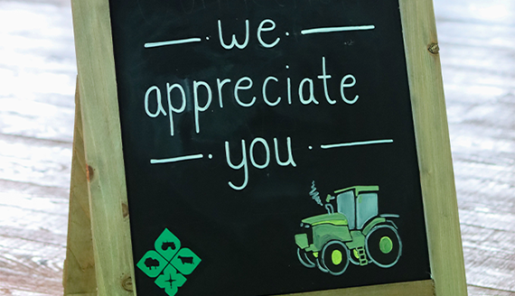 We appreciate you written on an event chalkboard sign
