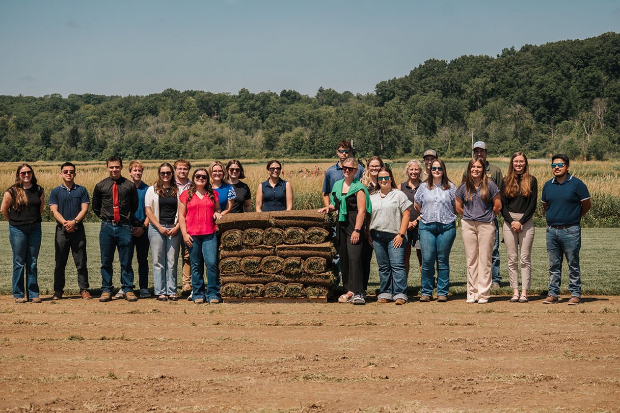 2026 Farm Credit East Interns on a sod farm