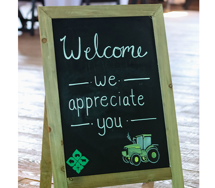 A sign reading welcome we appreciate you.