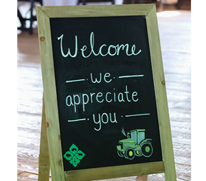 A sign reading welcome we appreciate you.