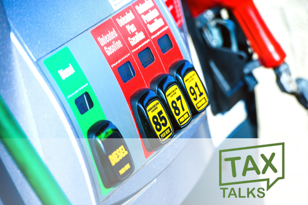 Close-up of a fuel pump showing diesel and gasoline grade buttons, with the Tax Talks logo.